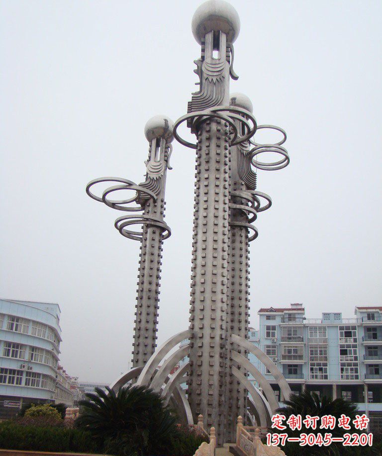 宁夏精美的不锈钢龙柱雕塑;