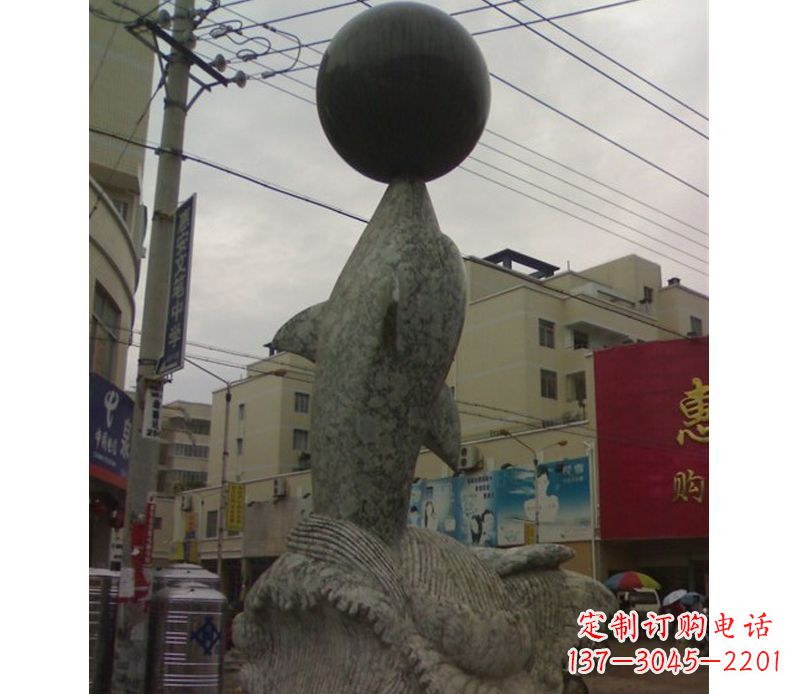 宁夏海豚戏球石雕