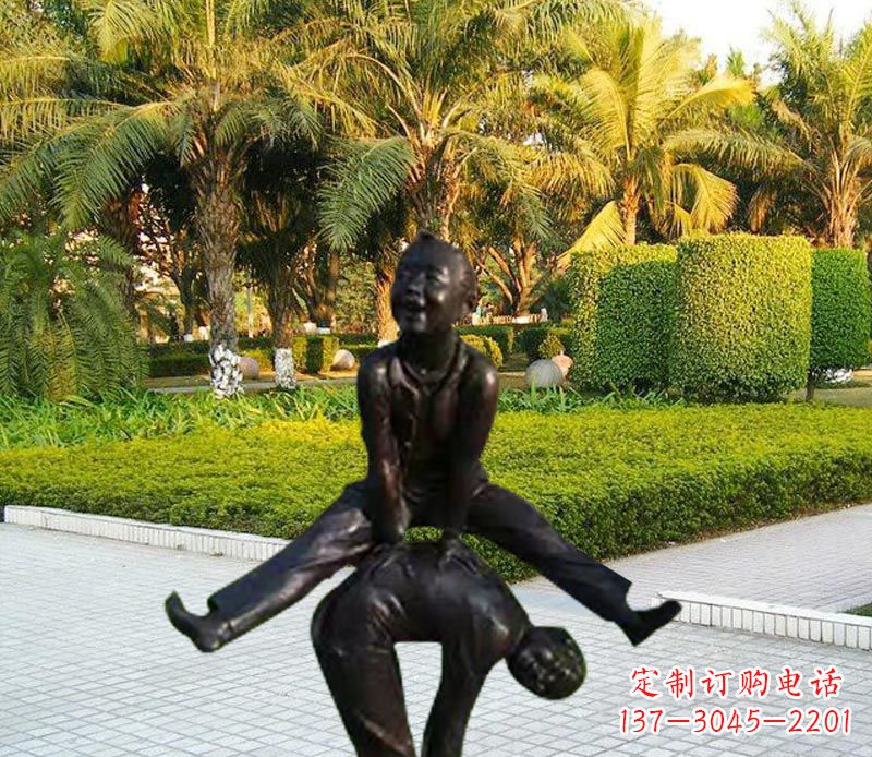 宁夏跳山羊的儿童铜雕