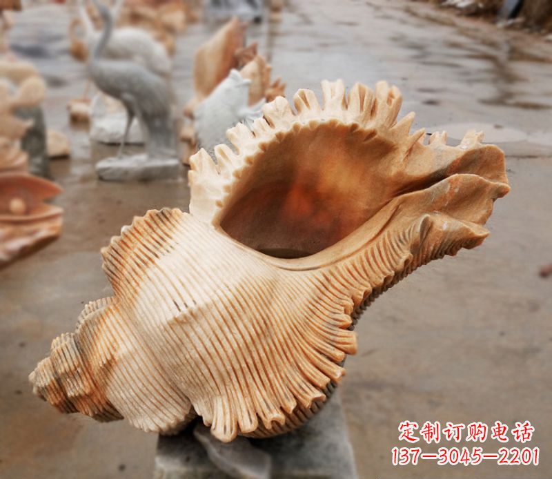 宁夏晚霞红海螺石雕广场景观雕塑