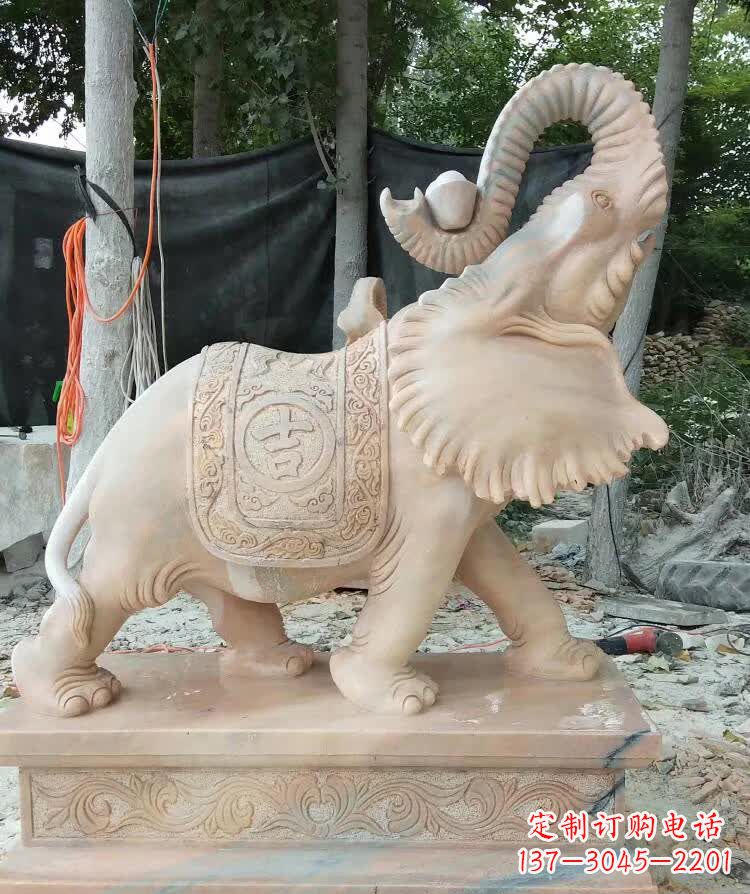 宁夏晚霞红卷元宝大象雕塑