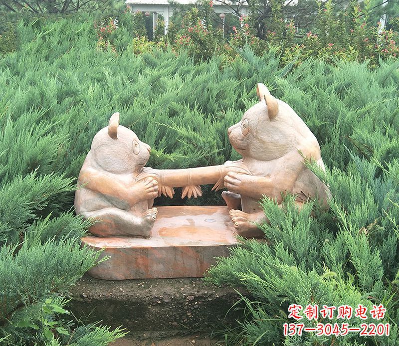 宁夏晚霞红熊猫母子石雕
