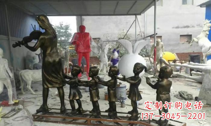 宁夏校园老师和儿童铜雕